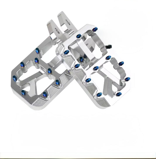 ￼Amped blue titanium ultra bee foot pegs
